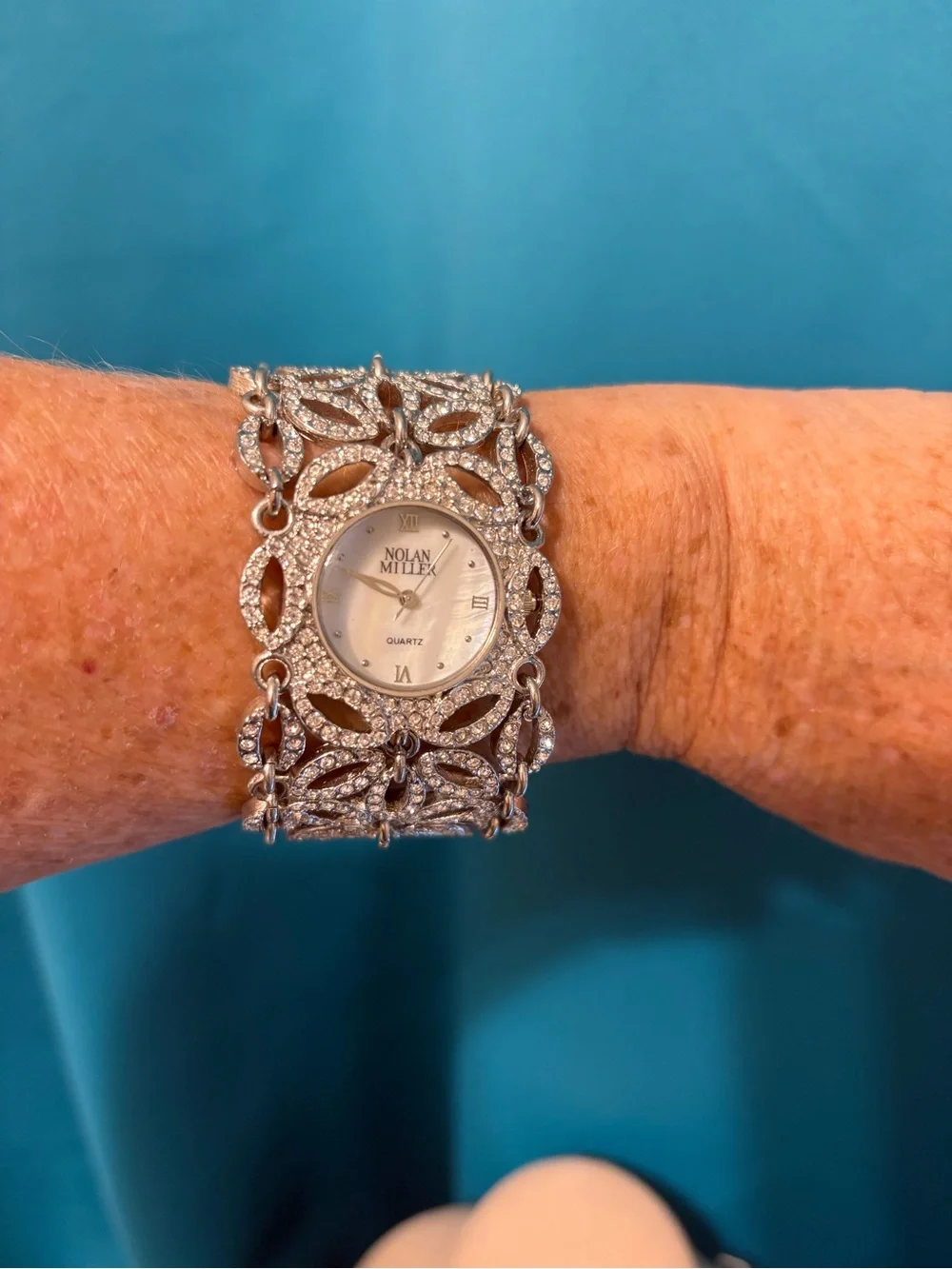 nolan miller watch stunning  silver tone rhinestone floral 7.5” needs battery